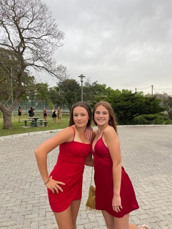 Miss Friday dress rental in Stellenbosch, South Africa - red sparkle dress - girl on left