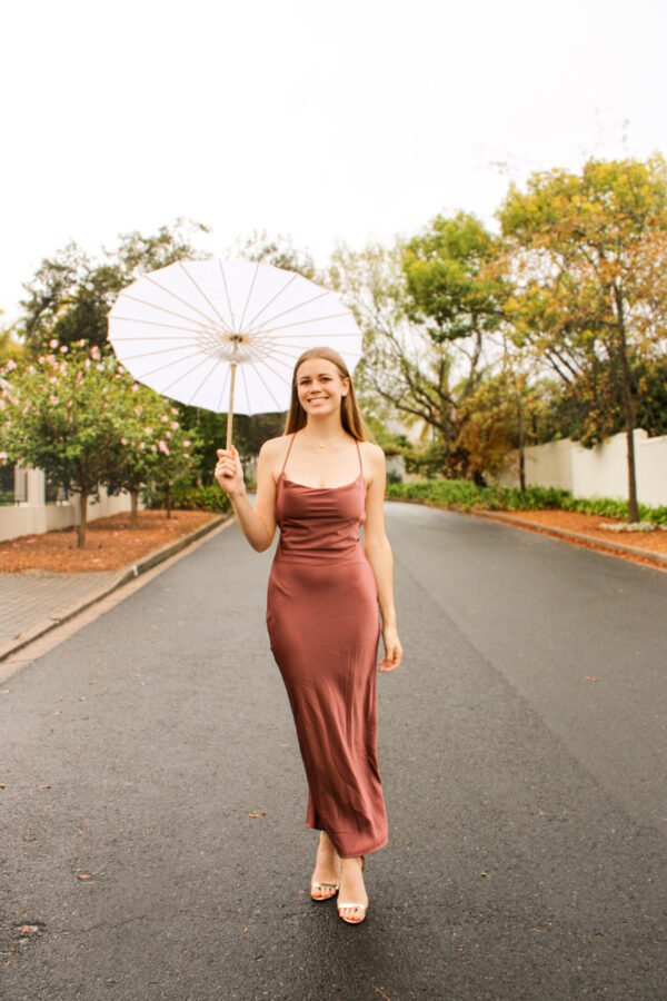 Rent the Pink long satin dress with adjustable straps and tie-back in Stellenbosch, South Africa from Rokkies.