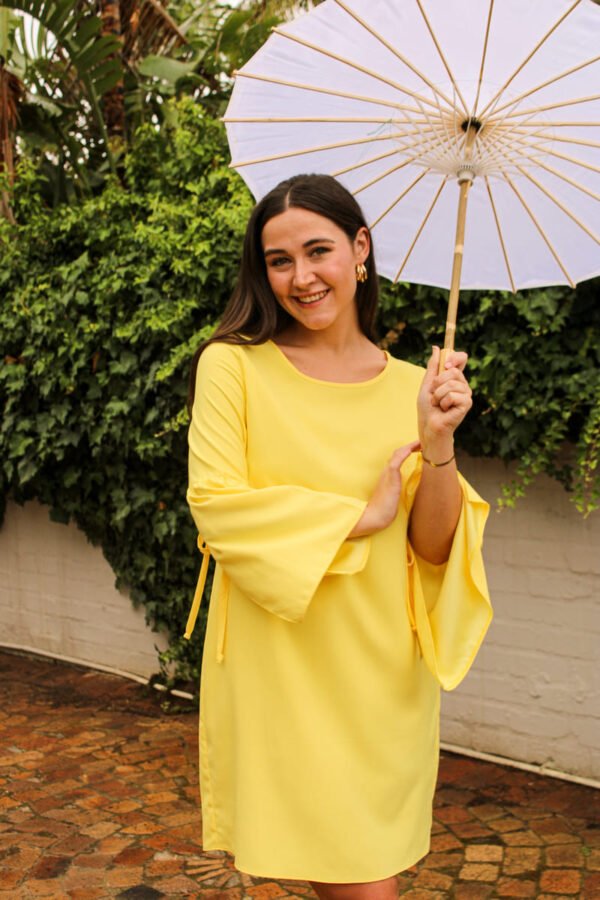 Rent the Sun's Up short yellow shift dress with wide sleeves in Stellenbosch, South Africa from Rokkies.